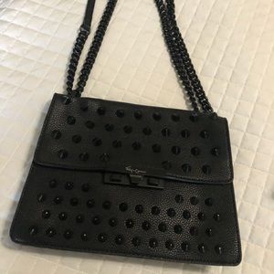 Foley and Corinna spiked purse